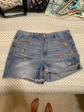 American Eagle Outfitters Blue Denim Shorts with Yellow Daisy Embroidery